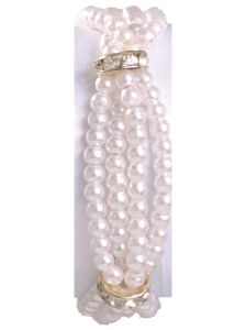 LA13- Our Lauren Corsage Bracelet has four rows of beads with a disk to add flowers and is available in 3 different colors. 